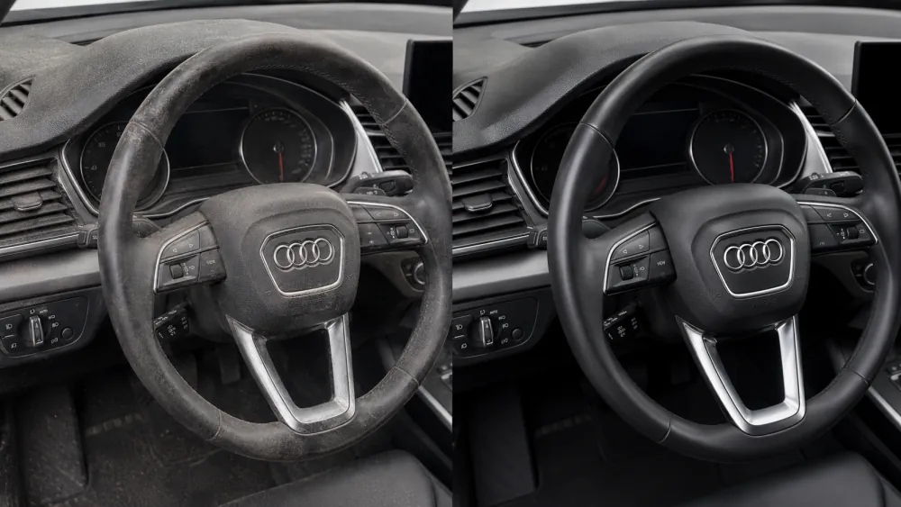 Before and after interior detailing with dust removed from an Audi steering wheel and dashboard — before